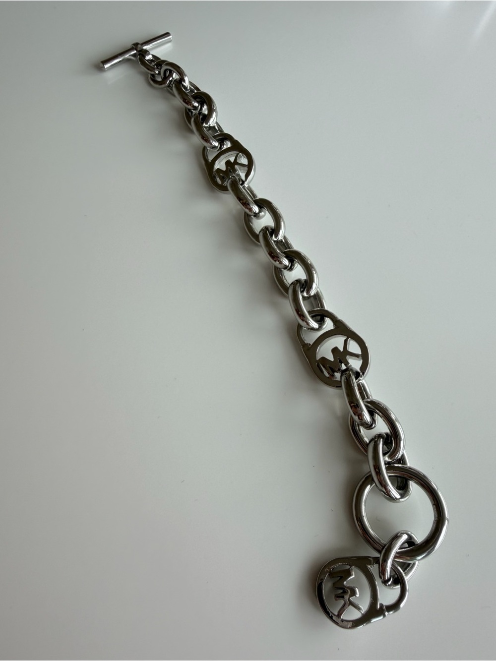 Michael Kors Polished Silver-Tone MK Charm Chain Bracelet - Picture 5 of 5